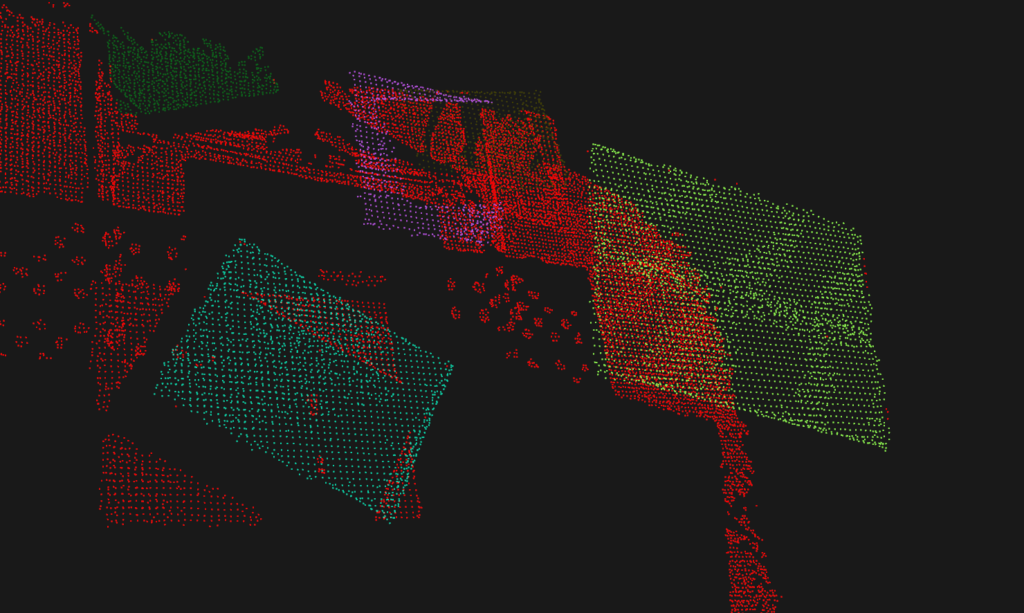 Cardboard boxes viewed with the Segmentation code example. The colors are generated by PCL for each segment.